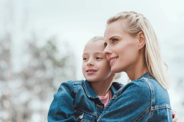 Happy family of blonde mother and adorable daughter — Stock Photo