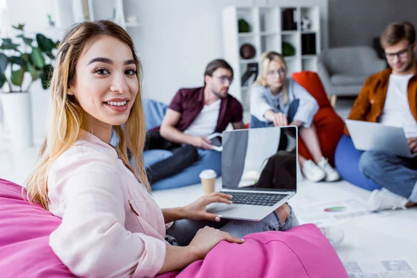 Asian businesswoman working on startup project in office with laptop — Stock Photo