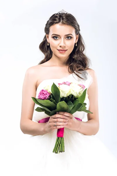 Attractive young bride in wedding dress with bouquet isolated on white — Stock Photo
