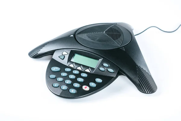 Close-up shot of black conference phone isolated on white — Stock Photo