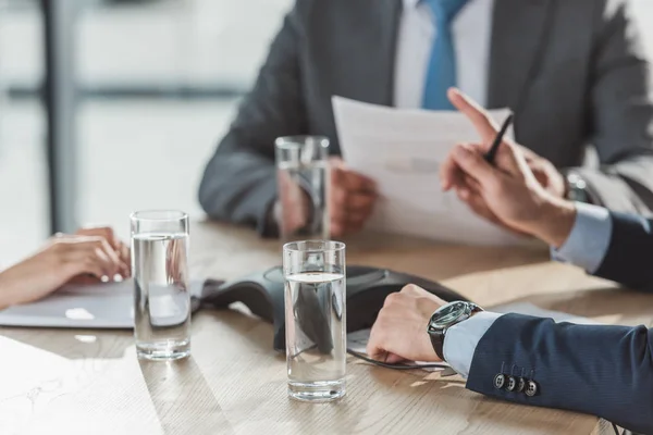 Cropped shot of business people having conversation — Stock Photo