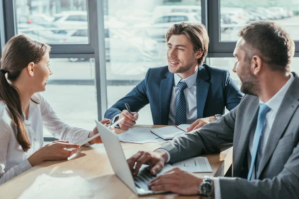 Smiling successful business people working together at modern office — Stock Photo
