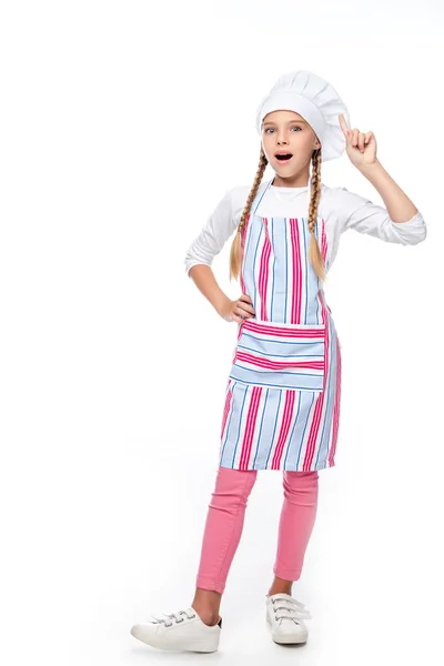 Überraschtes Schulkind im Kostüm von Koch zeigt Ideengeste isoliert auf Weiß — Stockfoto