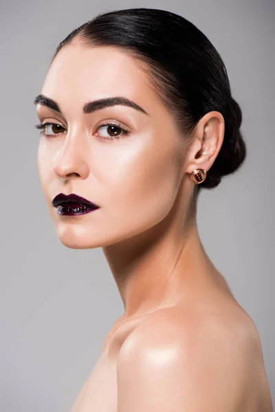 Portrait of fashionable nude girl with black lips, isolated on grey — Stock Photo