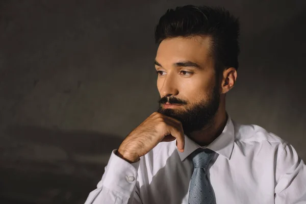 Portrait of bearded pensive professional businessman — Stock Photo