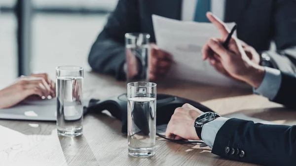 Cropped shot of business people having conversation — Stock Photo