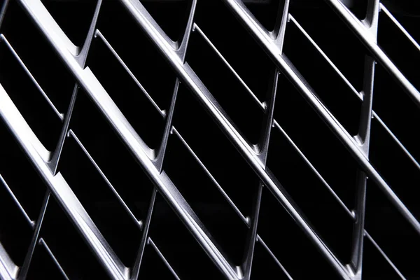 Полная рамка металлической решетки автомобиля в качестве фона — стоковое фото