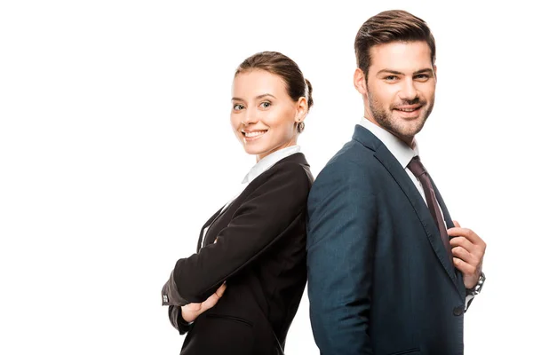 Happy young business partners leaning back to back and looking at camera isolated on white — Stock Photo