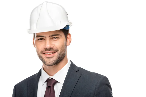 Ritratto di giovane architetto di sesso maschile in cappello duro guardando la fotocamera isolata su bianco — Foto stock
