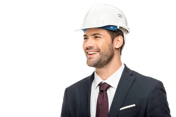 Retrato de un joven arquitecto sonriente mirando hacia otro lado aislado sobre blanco - foto de stock