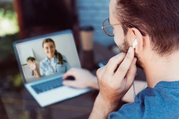 Selective focus of colleagues taking part in webinar with laptop — Stock Photo