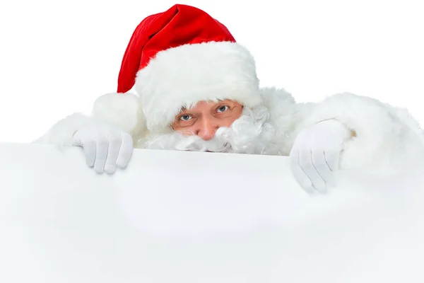 Weihnachtsmann mit leerem Plakat isoliert auf weiß — Stockfoto