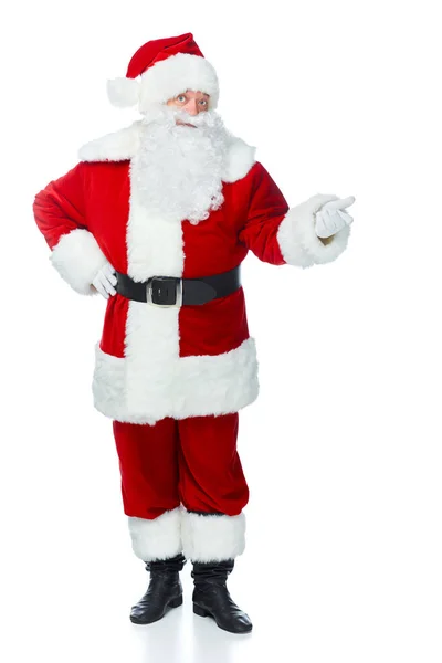 Surprised santa claus showing something isolated on white — Stock Photo