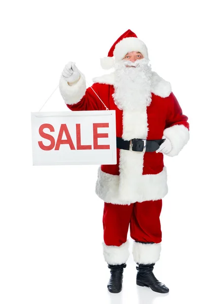 Felice Babbo Natale tenendo bordo vendita isolato su bianco — Foto stock