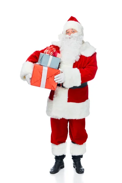 Santa claus with white beard holding christmas presents isolated on white — Stock Photo