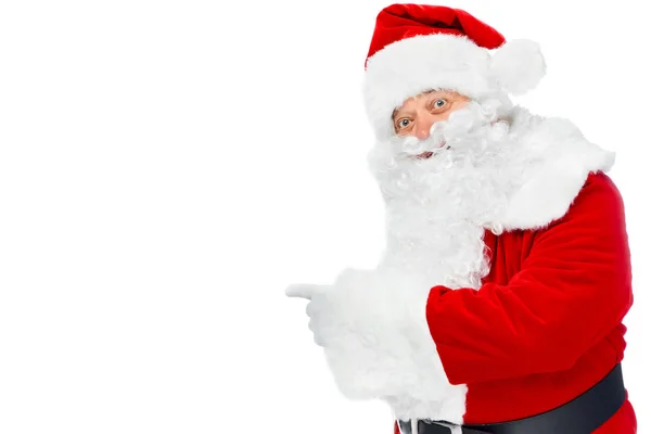 Bearded santa claus pointing at something isolated on white — Stock Photo