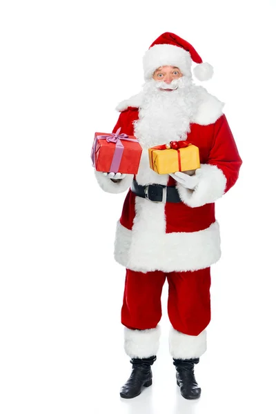 Bearded santa claus with christmas gift boxes isolated on white — Stock Photo