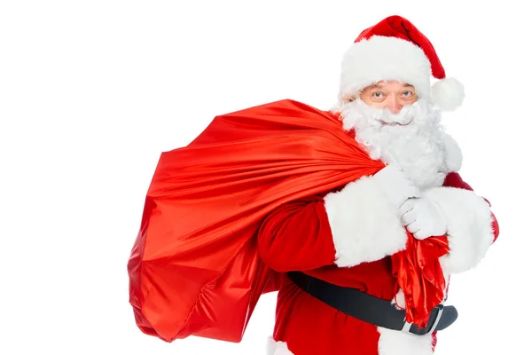 Santa claus llevar bolsa roja en navidad aislado en blanco - foto de stock