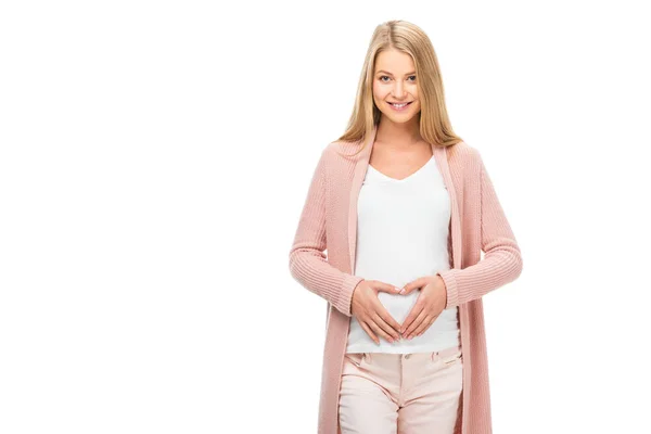 Femme enceinte souriante montrant signe cardiaque avec les mains isolées sur blanc — Photo de stock