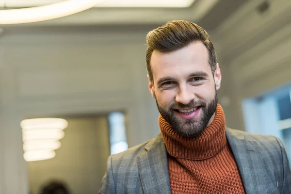 Portrait of smiling man in formal wear looking at camera — Stock Photo