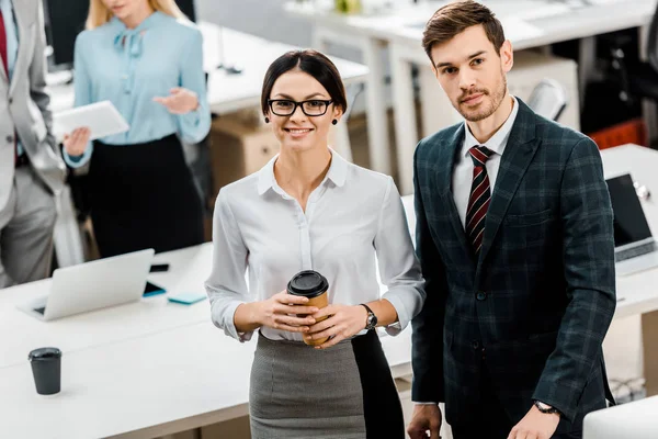 High angle view of smiling business colleagues in office — Stock Photo