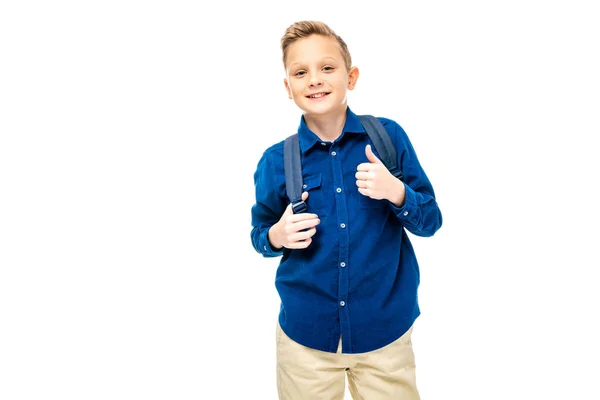 Colegial en camisa azul mostrando el pulgar hacia arriba y sonriendo a la cámara aislada en blanco - foto de stock