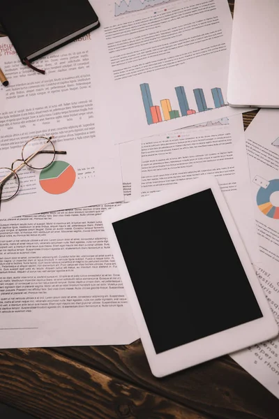 Top view of digital tablet with blank screen and business documents — Stock Photo