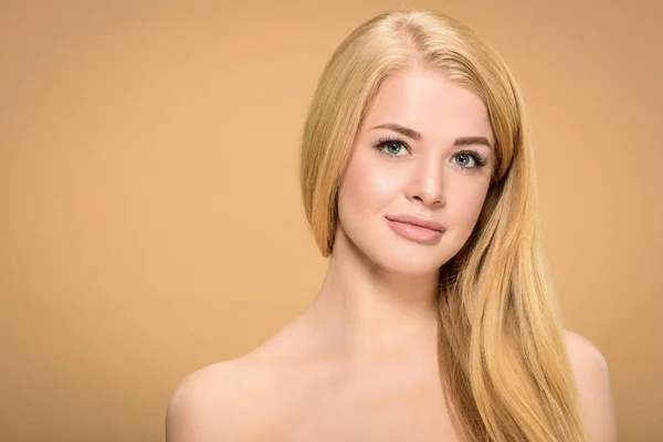 Studio shot of pretty young woman with straight hairstyle — Stock Photo
