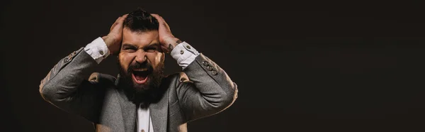 Aggressive beard businessman in gray jacket yelling isolated on brown — Stock Photo