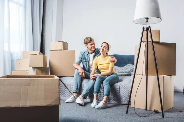 Beautiful Young Couple Sitting Bed Moving New Home Surrounded Boxes — Stock Photo, Image