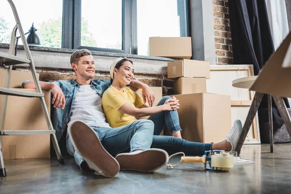 Beautiful Young Couple Sitting Floor New Home Surrounded Boxes — Stock Photo, Image
