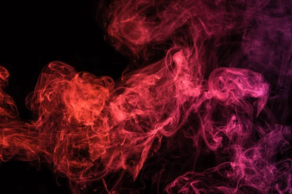 黒の背景に赤い精神的な煙のような渦巻き — ストック写真