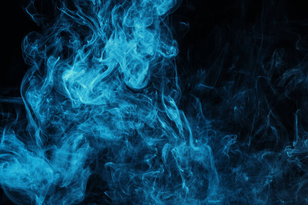 blue mystical smoke on black background 