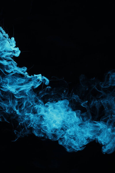 Blue spiritual smoke on black background