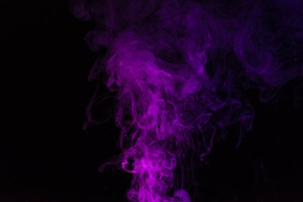 Spiritual pink smoky swirl on black background