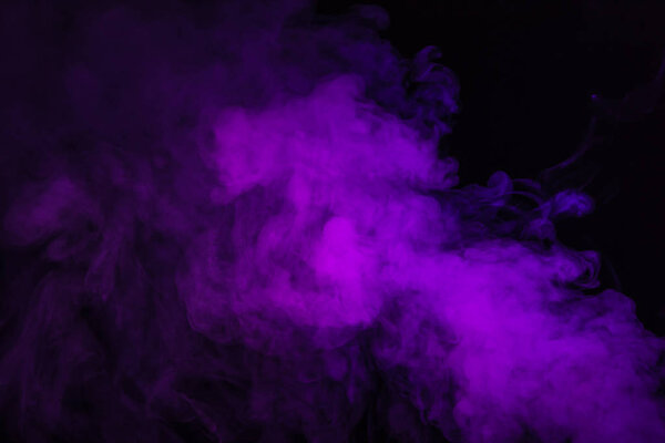 Purple spiritual smoke on black background