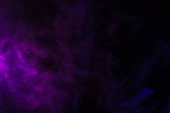 abstract black background with purple smoke, studio shot
