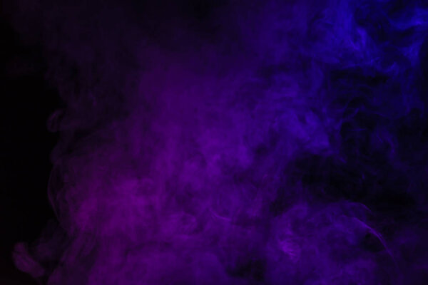 abstract black background with purple smoke  
