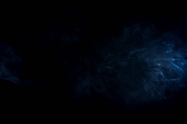 blue abstract smoke on black background with copy space