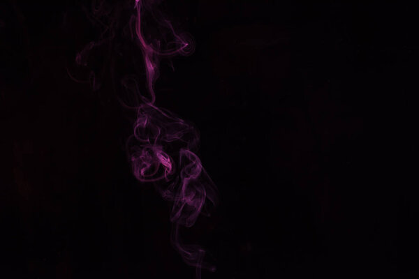 Black background with mystical pink smoky swirl