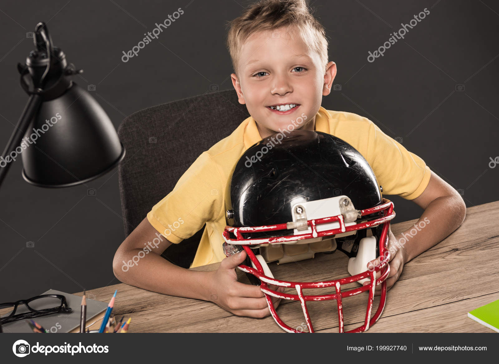 Happy Schoolboy Sitting American Football Helmet Table Eyeglasses