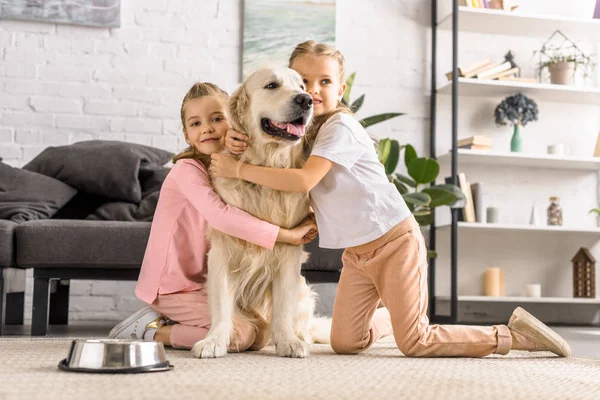 Adorable Kids Hugging Golden Retriever Dog Together Home — Stock Photo, Image