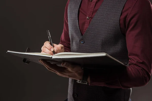 Cropped Shot Businessman Taking Notes Notepad Isolated Black — Stock Photo, Image