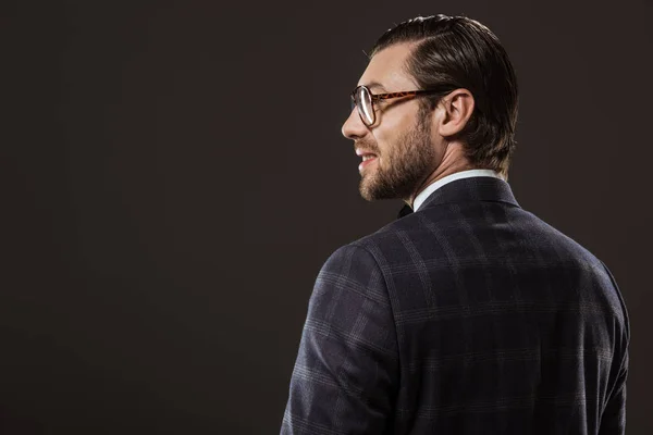 Back View Handsome Smiling Man Eyeglasses Looking Away Isolated Black — Stock Photo, Image