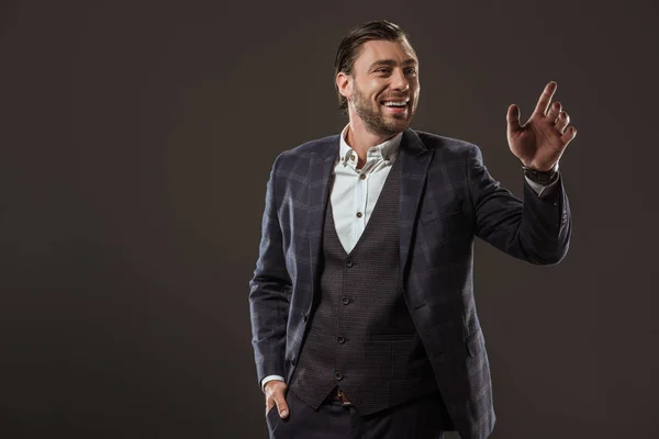 Handsome Smiling Businessman Waving Hand Looking Away Isolated Black — Stock Photo, Image