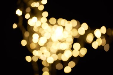 siyah arka plan üzerine güzel parlak altın bokeh