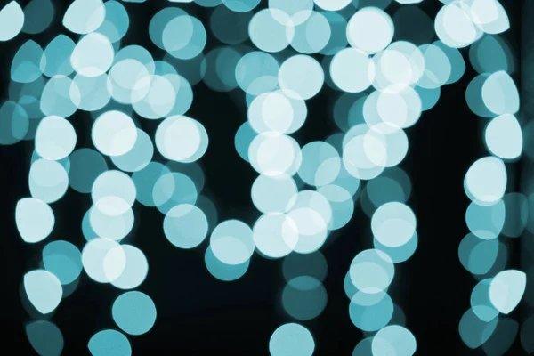 Beautiful Light Blue Shiny Defocused Bokeh Black Background — Stock Photo, Image