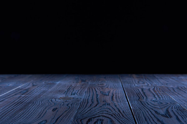 empty blue wooden planks surface on black background