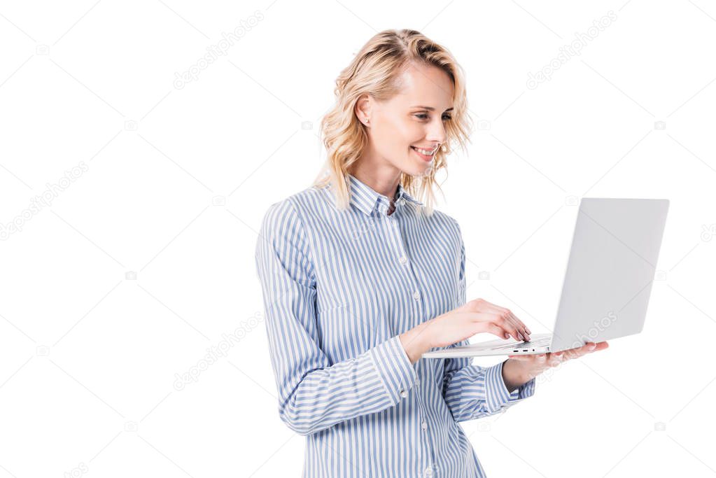 attractive woman using laptop isolated on white