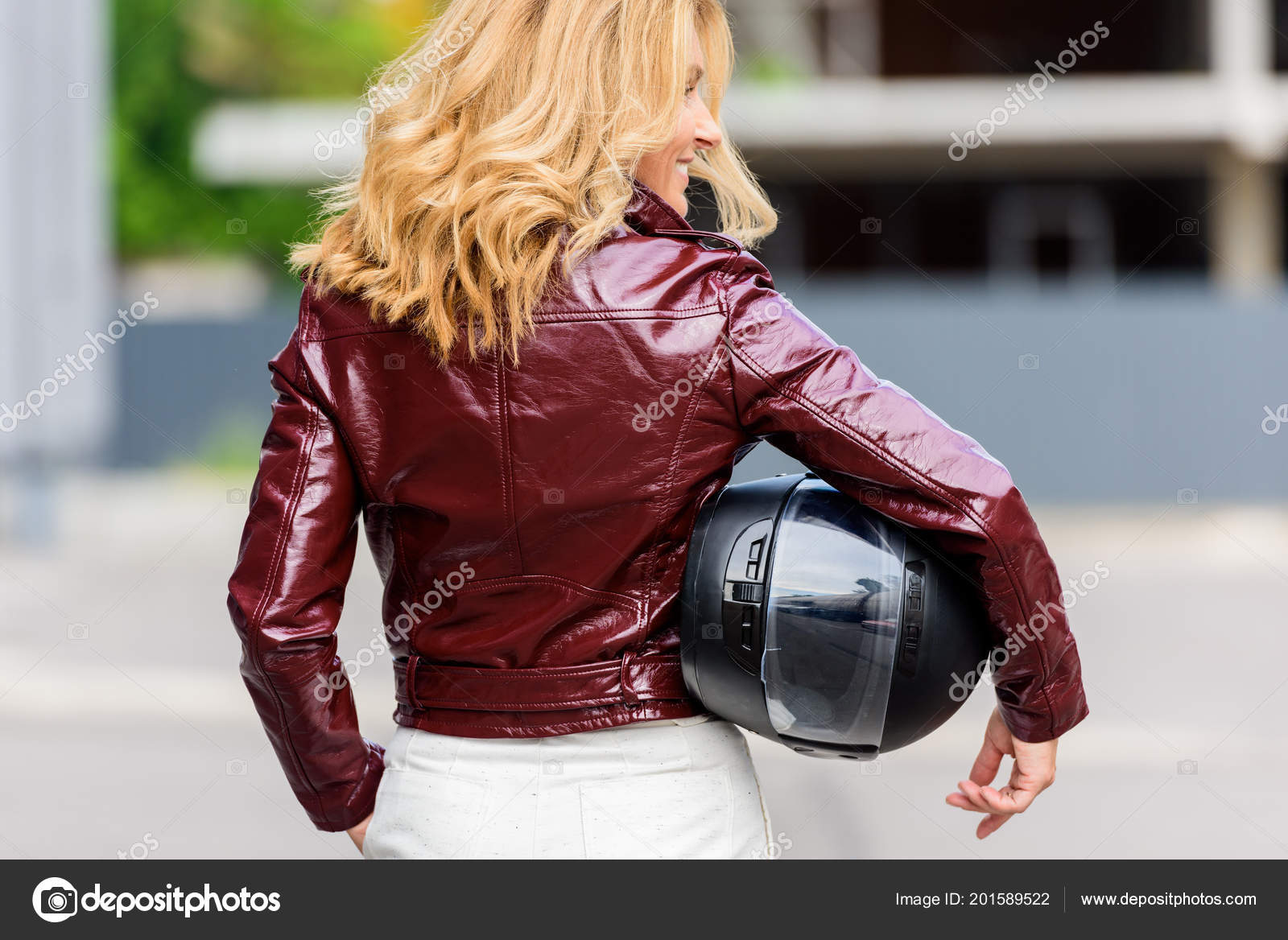 Back View Woman Leather Jacket Holding Motorcycle Helmet Street
